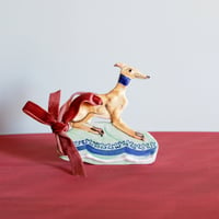 Image 1 of Hanging Whippet Ornament - Fawn with slip trailed relief pattern