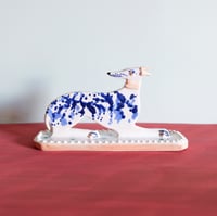 Image 2 of Large Whippet Ornament - cobalt with pink collar and clover base