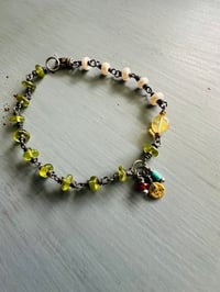 Image 1 of bohemian pearl and gemstone 22k gold charm bracelet