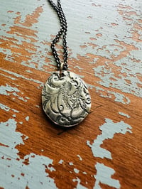 Image 1 of sterling silver double sided pendant necklace