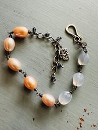 Image 1 of chunky peach pearl and lavender chalcedony sterling silver charm bracelet