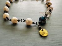 Image 4 of bohemian pearl and imperial topaz 22k gold charm bracelet