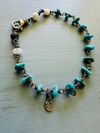 Image 1 of bohemian turquoise and sterling silver charm bracelet