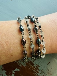 Image 1 of solstice rainbow moonstone and peacock pearl bracelet