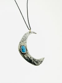 Image 5 of turquoise moon necklace with handwritten Shakespeare quote