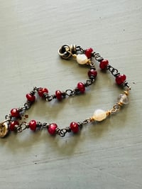 Image 1 of boho ruby and pearl charm bracelet . 14k gold and sterling silver