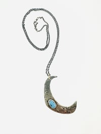 Image 8 of turquoise moon necklace with handwritten Shakespeare quote