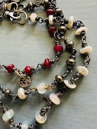 Image 9 of boho ruby and pearl charm bracelet . 14k gold and sterling silver