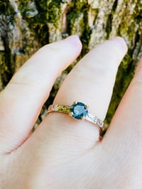 Image 3 of size 7 fair trade teal blue Australian sapphire engagement ring