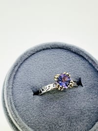 Image 1 of size 7.5 purple spinel engagement ring with engraved vine band