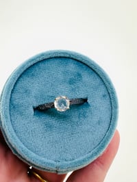 Image 1 of size 8 rose cut sapphire engagement ring with engraved vine band