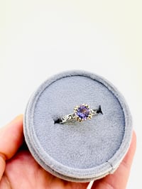 Image 2 of size 7.5 purple spinel engagement ring with engraved vine band