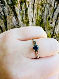 Image 9 of size 7 fair trade teal blue Australian sapphire engagement ring