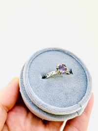 Image 4 of size 7.5 purple spinel engagement ring with engraved vine band