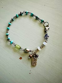 Image 1 of bohemian turquoise and pearl charm bracelet . handmade by peacesofindigo