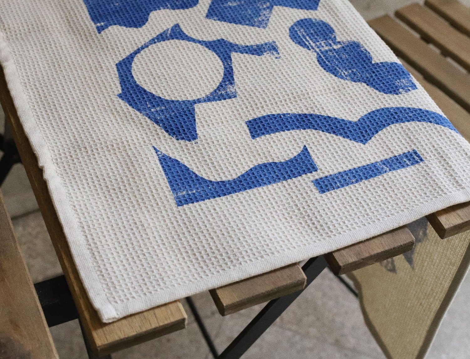 Image of BLUE SHAPES WAFFLE TEA TOWEL