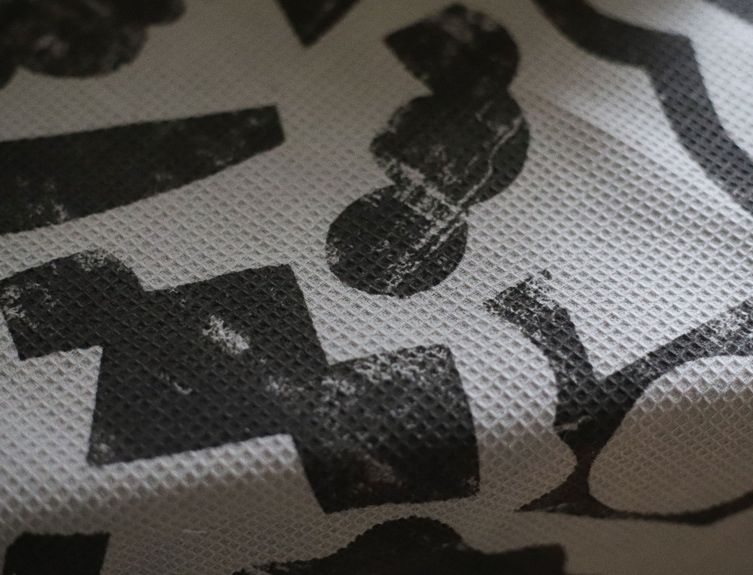 Image of BLACK SHAPES WAFFLE TEA TOWEL