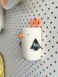 Image of Little Penguin 2 – hanging ceramic wall vessel