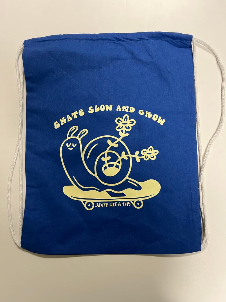 Image of Skate Slow and Grow Drawstring Bag