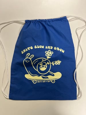 Image of Skate Slow and Grow Drawstring Bag