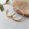 mixed metals faceted hoop earrings