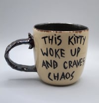 Image 2 of this kitty woke up and craves chaos 🐈