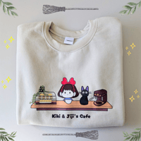 Image 1 of Kiki & Jiji Cozy Cafe Vibes | Studio Ghibli | Unisex Crewneck Sweater 