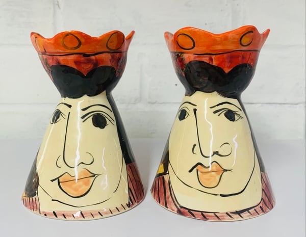 Image of Red and orange candle sticks