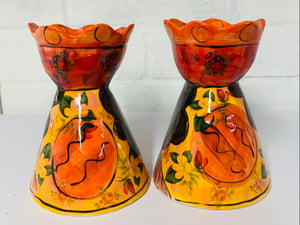 Image of Red and orange candle sticks