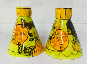 Image of Lime green and orange candle sticks