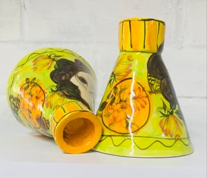 Image of Lime green and orange candle sticks