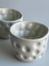 Image of small porcelain beakers 