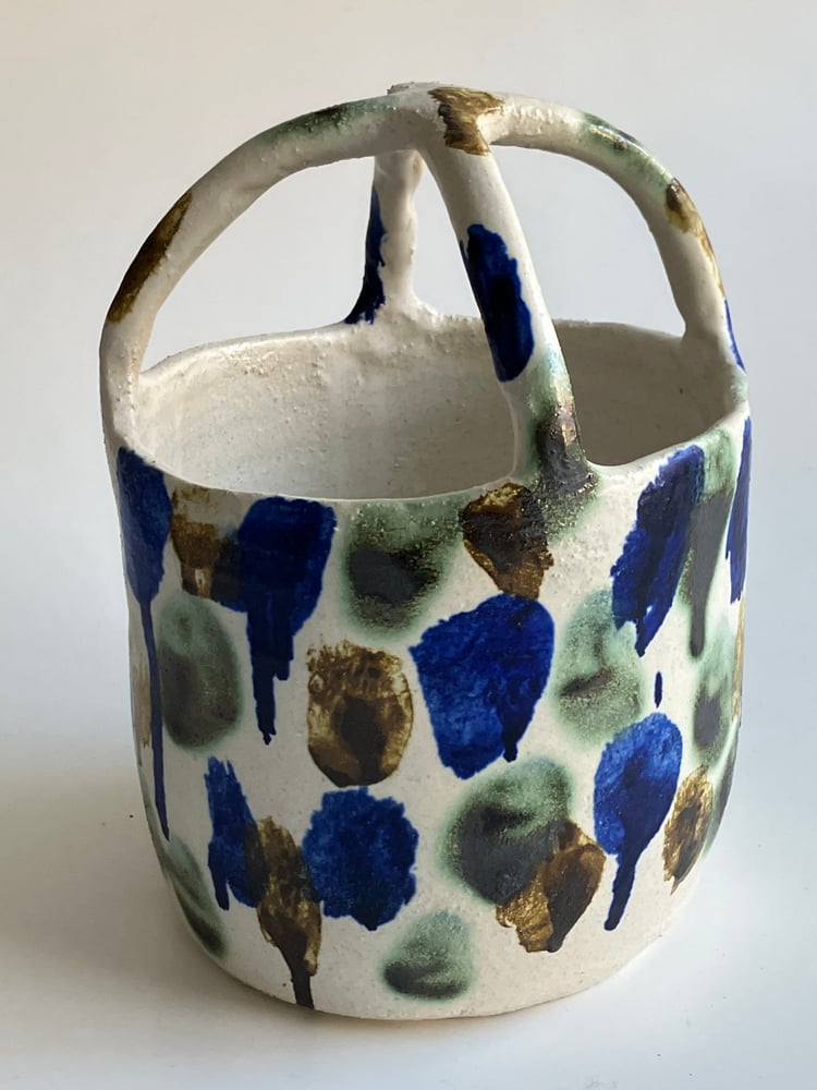 Image of spotted stoneware basket