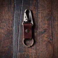 Old Dutch Snap Trigger Key Chain. (Dark brown).