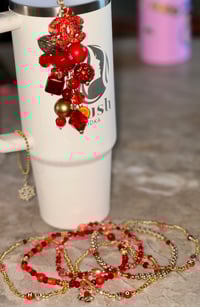 Image 1 of Dangling straw charm