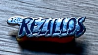 Image 1 of Chrome and Black Vitreous Enamel REZILLOS Script Lapel Badge