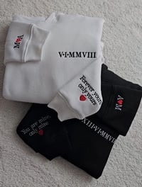 Roman Numerals With Eachothers Initials And a special sleeve message