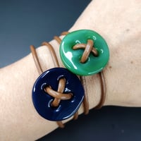 Image 4 of Button wear