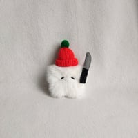 Image 1 of Star with knife