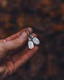 Silver beaded fern hoop earrings 