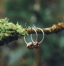 Silver and bronze hagstone hoop earrings 