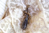 Image 1 of Anciens Mixed Metal Celestial Moon Fossil Orthoceras Cherub Angel Victorian Necklace OOAK