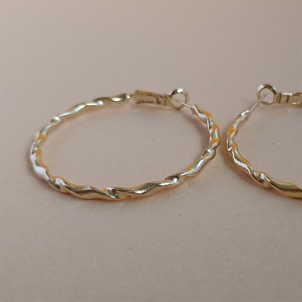 Image of PENDIENTES IRIA TORCION