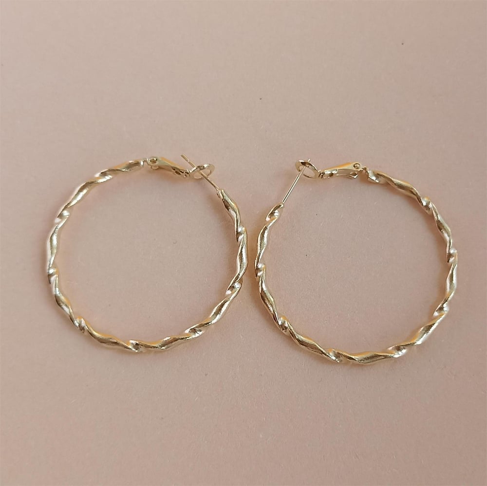 Image of PENDIENTES IRIA TORCION