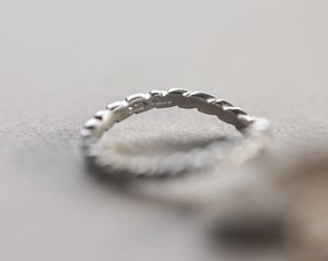 Image of Platinum 2mm laurel carved wishbone ring