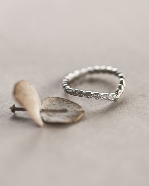 Image of Platinum 2mm laurel carved wishbone ring