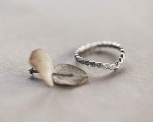 Image of Platinum 2mm laurel carved wishbone ring