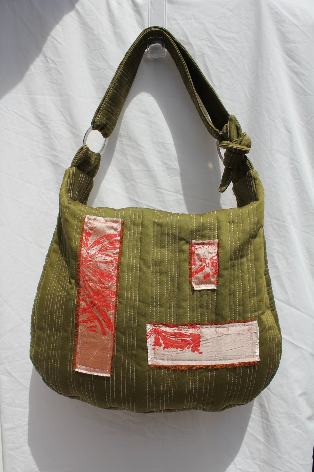 Image of 'vessel to hold your baggage' 006 - large quilted green/pink