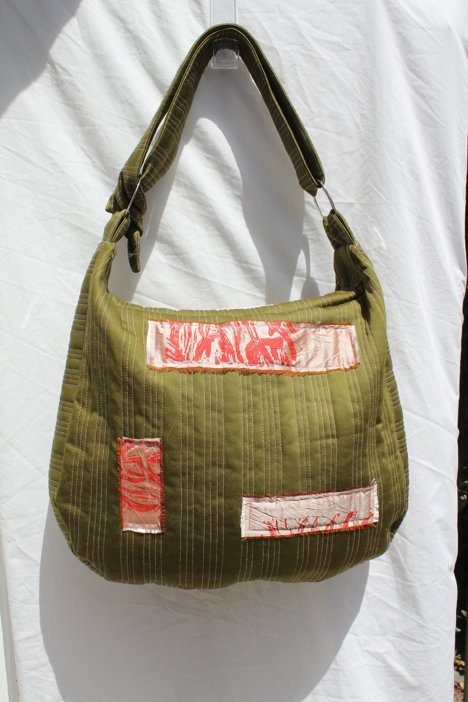 Image of 'vessel to hold your baggage' 006 - large quilted green/pink