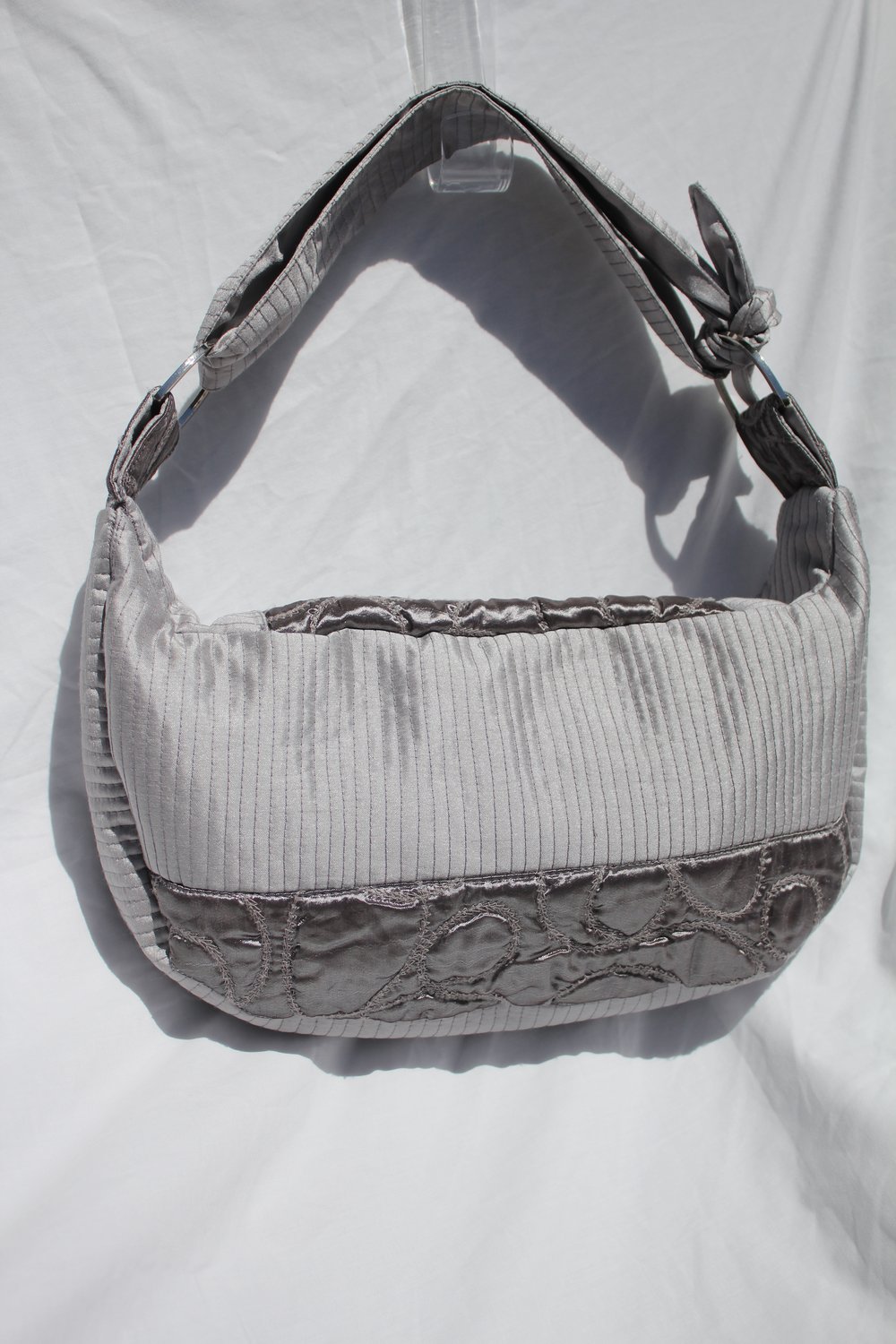 Image of 'vessel to hold your baggage' 001 - small quilted silver